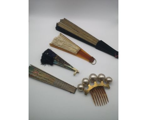 A lot of four antique ornate fans, together with an art deco hair slide