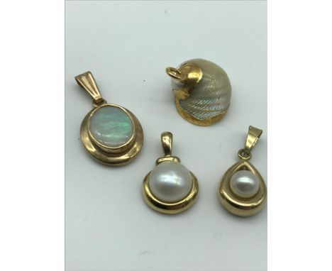 Three 9ct gold pendants which includes Large opal stone and two single pearls. Together with Shell and possibly gold pendant.