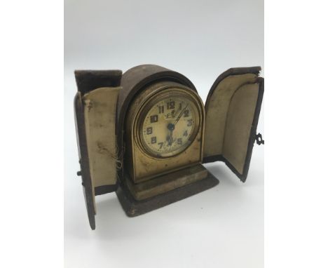 Antique French Brevete travel alarm clock. Comes with carry case, Working order. 