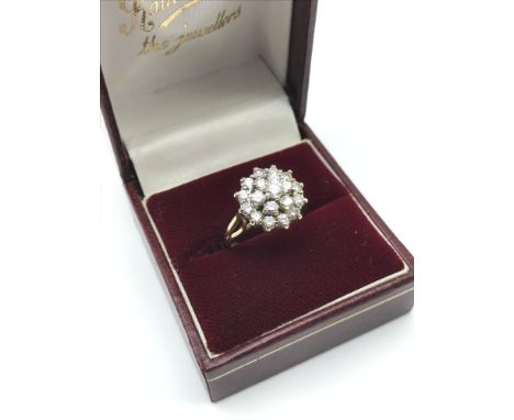 A Beautiful example of a 9ct gold and Diamond cluster ring. 1.00ct of diamonds. Ring size K. 