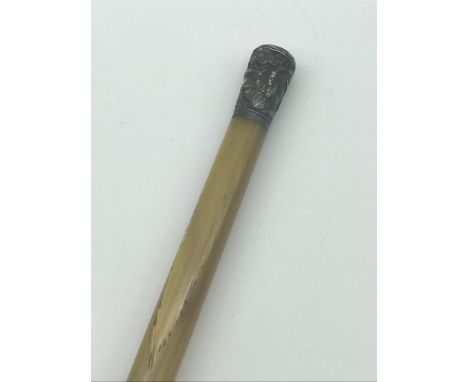 Antique oriental silver top walking cane/ swagger stick. Shaft is made of bone. Measures 69cm in length.