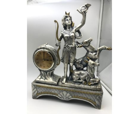 A Large Quartz Italian mantle clock by Mauro Manetti for Fonderia D'Arte. Styled with a lady figurine and two deer figures. S