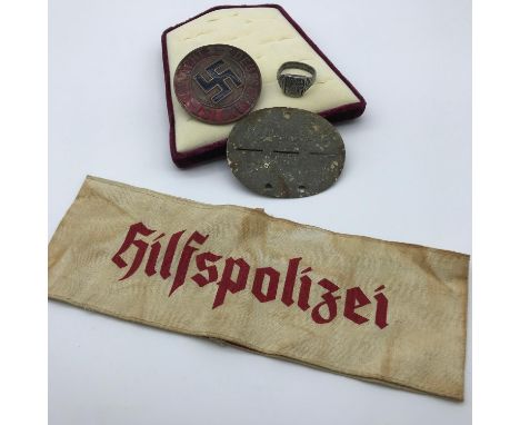 A lot of Nazi German items to include Hilfspolizei police force arm band, Norge 1940 ring, SS GEB. JAGA. UE BAT.6 Metal dog t