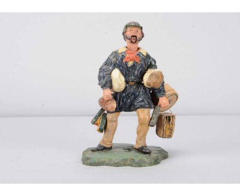 A mid 19th century German papier-mâché delivery man nodder, with cap inscribed ‘Poste aux Commissions’, fine brown beard, art