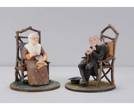 A mid to late 19th century Thüringen Derby and Joan elder couple, papier-mâché, the man resting hands on a walking stick and 