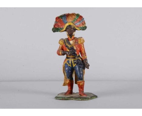 A mid 19th century papier-mâché Emperor of Haiti Faustin-Élie Soulouque nodder, wearing elaborate and colourful military unif