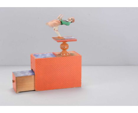 A mid 19th century German acrobat tumbling toy,  papier-mâché headed with black painted hair and beard Imperial, card and woo