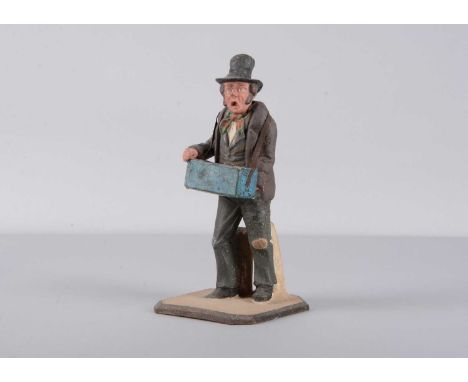 A mid 19th century Thüringen composition street vendor nodder,  the man upturned nose and open shouting mouth, brown hair wit