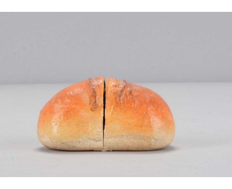 A German early 20th century novelty bread roll with appearing mouse, the painted composition elongated roll, when open down t