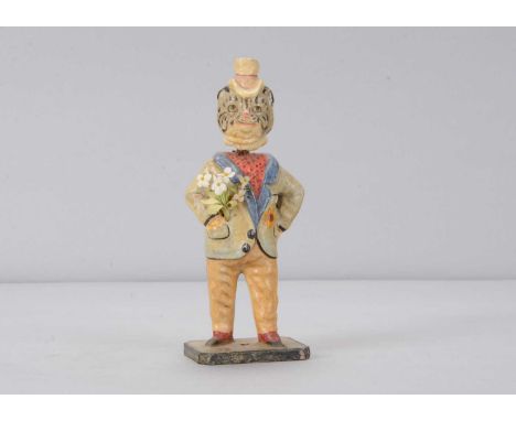 A late 19th century Thüringen anthropomorphic Aesthetic gentleman tabby cat nodder, papier-mâché with green painted eyes, pin