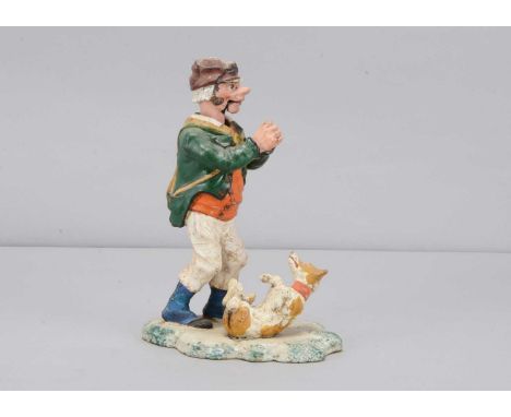 A mid to late 19th century Thüringen man with dog nodder,  papier-mâché man with articulated jaw, large nose, painted sidebur