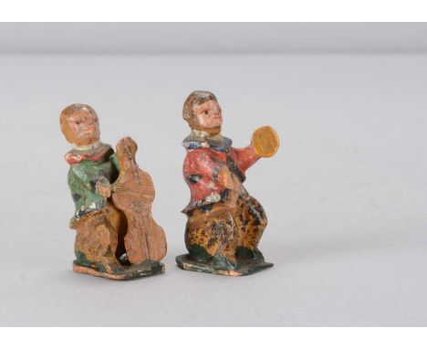 Two small 19th century Grödnertal (Ortisi) dressed monkey musicians, carved and painted wooden seated monkeys, each with a wh