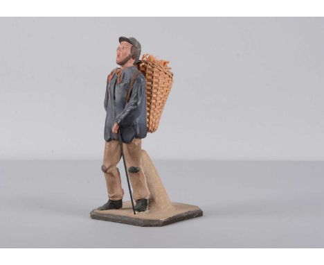 A mid 19th century Thüringen composition street vendor nodder,  the man with open shouting mouth, brown hair with chin strap 