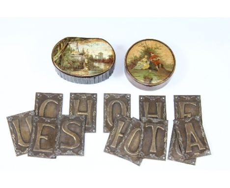 An early papier mache snuff box and a hand painted orange phenolic patch box. Together with 13 pressed brass letters.