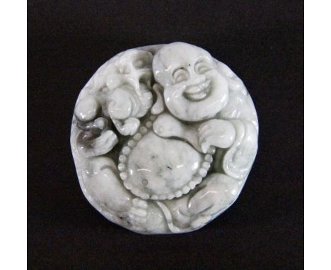 A Chinese carved jade Buddha amulet, Dia 4.8cm