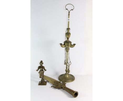 An eastern brass oil lamp (57cm), brass staff head and ceremonial figure