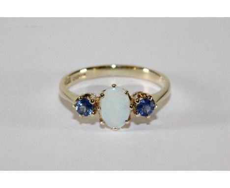 A 9ct gold opal and sapphire 3 stone ring (M)