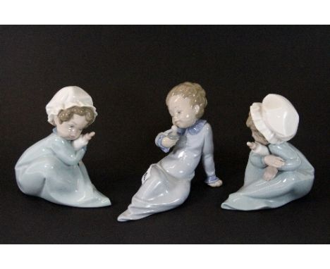 3 Lladro figures of babies with bottles