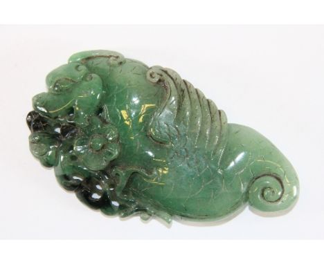 A very unusual mixed colour Chinese carved jade figure of a winged dragon, 11cm x 6cm x 1.5cm, Est. £500 - £700
