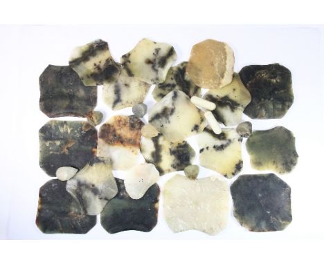 A collection of 19th century Chinese carved jade water lily leaves and seed pods (average size 11 x 12cm)
