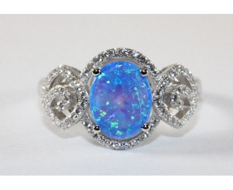 A .925 silver faux opal and stone set ring (S)