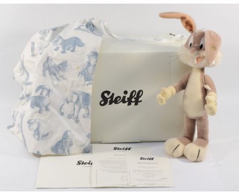 A Steiff x Looney Toons collaboration bear, depicting the character Bugs Bunny, with original box and certificate of authenti