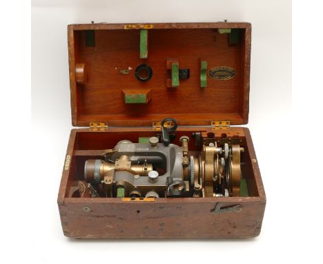 An early 20th century surveyor's theodolite, by Cooke of York England, fitted mahogany case.