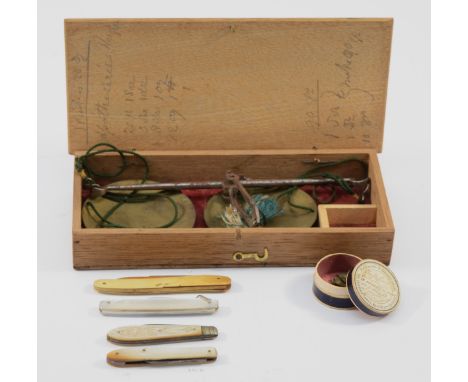 A set of steel and brass travelling scales, with weights, box, together with a silver and mother of pearl fruit knife and thr