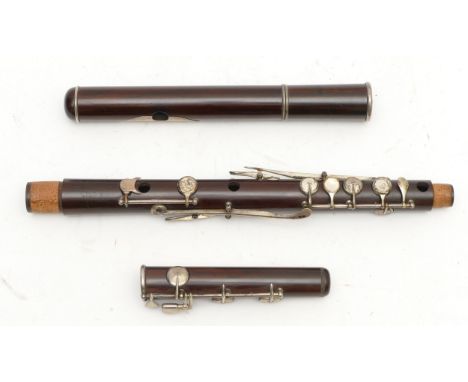 A Rudall &amp; Rose cocus wood and silver plated keywork boehm system flute, No.35, circa 19th century, three piece with Cart