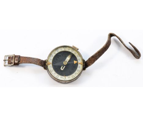 A WW2 Russian army wrist compass, made by Botock (Vostok) stamped 1939.