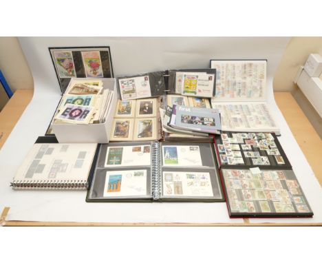 A large collection of stamps, postcards and first day covers, to include a Coronation Street postcard with Coronation Street 