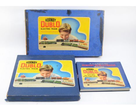 Hornby Railways; comprising Dublo train set B.R class 69567 engine, two carriages and five goods wagons, together with a Dubl