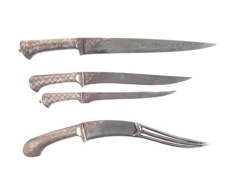 Indo-Persian Pesh Kabz or chain mail piercing dagger, together with three other similar knives which have Damascus steel blad
