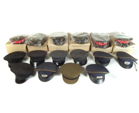 Collection of peaked caps, including six boxed army caps in unissued state two of each in sizes 53, 54, and 55, sixteen caps 