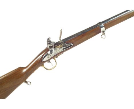 Replica inert French flintlock carbine, 30.5 inch barrel secured by two bands, saddle ring bar to side. No licence required t