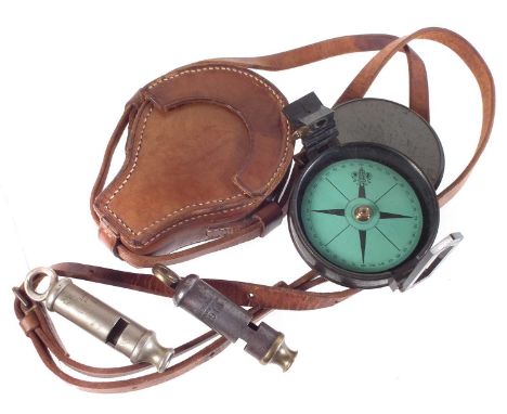 WWI prismatic compass by Lawrence and Mayo London, with green card dial and sight vane, the inside of the lid scratched Error