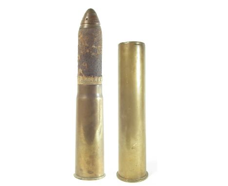 Composed WW1 shell, fitted into a 1918 dated case. This case was for the modified (and rarer) "Ordnance QF 13 pdr Mk III" and