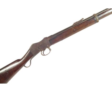 Martini Henry .577/450 rifle, 32 inch barrel secured by two bands one with bayonet attachment, folding ladder sight, serial n