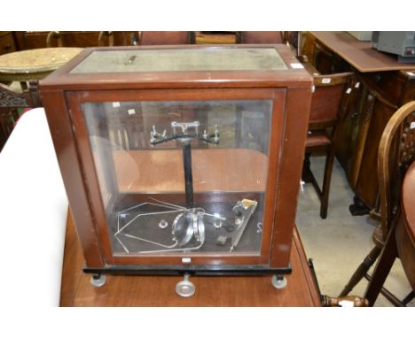 A set of scientific balance scales by Baird and Tatlock, cased 