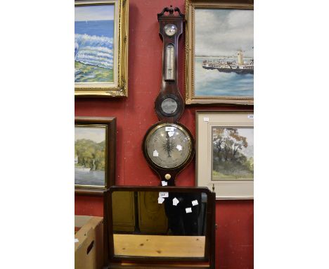 An Edwardian mahogany wheel barometer; a Regency mahogany dressing mirror (2)