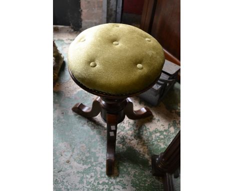 A Victorian adjustable piano stool, circular button upholstered seat, turned column and underfinial, three cabriole legs, cir