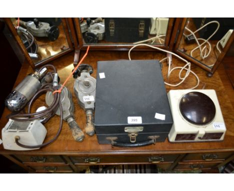 A vintage electrical S Buchbinder stimulation set by Longfords; two Dr. Macura's Blood Circulators; a Pifco Foot Massager; a 
