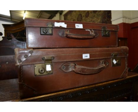 A vintage leather suitcase; another, smaller (2)