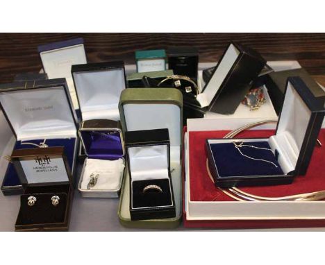 LARGE COLLECTION OF BOXED STERLING SILVER JEWELLERY
including Ernest Jones, H Samuel, chains, necklaces, rings, bracelets, et