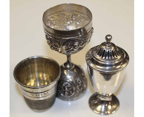 SILVER PEPPER SHAKER
together with an Indian white metal two sided cup and a silver plated 'Just a Thimble Full' novelty hunt