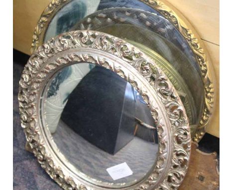 FOUR DECORATIVE MIRRORS
comprising one mirror with a brass frame and finial modelled as a clipper ship, two circular mirrors 