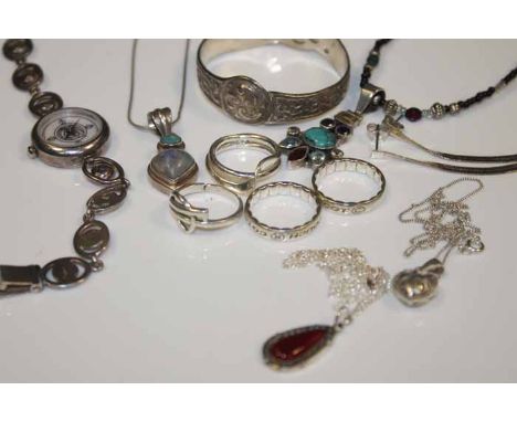 COLLECTION OF STERLING SILVER JEWELLERY AND WATCHES
including rings, a silver quartz watch, pendant necklaces and chains and 