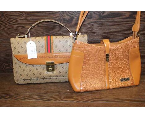 TWO GUCCI-STYLE LADY'S HANDBAGS
including a tan leather crocodile-effect bag; together with a Gucci-style material handbag 