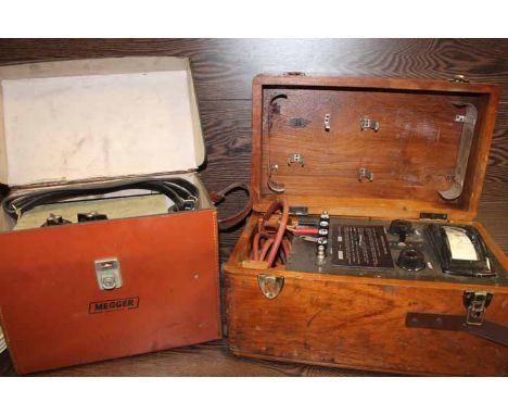 FOUR LARGE EARLY TO MID-20TH CENTURY ELECTRICAL MEASUREMENT TOOLS
including a voltmeter, a ohnmeter, volt bridge meter and on
