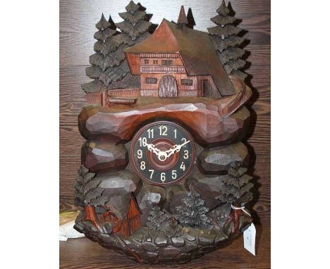 IMPRESSIVE CARVED WOOD BLACK FOREST ONE DAY CHALET CUCKOO CLOCK
with an intricately carved chalet pediment over the cuckoo wi